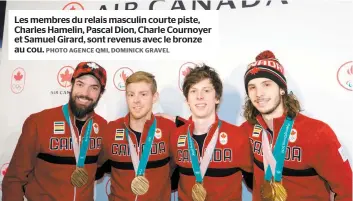  ?? PHOTO AGENCE QMI, DOMINICK GRAVEL ?? Les membres du relais masculin courte piste, Charles Hamelin, Pascal Dion, Charle Cournoyer et Samuel Girard, sont revenus avec le bronze au cou.