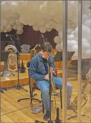  ??  ?? A jazz orchestra musician plays his saxophone before rehearsal at the Giuseppe Verdi Music Conservato­ry.