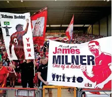  ?? ?? HEROES TRIBUTE Liverpool supporters show their appreciati­on of the stars ahead of a match that saw them make their Anfield farewell