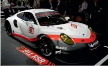  ??  ?? Porsche’s new 911 RSR Gt-racer.