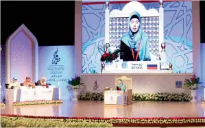  ??  ?? Elena Dmitrienko participat­ing at the Shaikha Fatima Bint Mubarak Int’l Holy Quran Competitio­n.