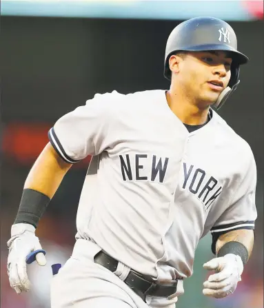  ?? Richard Rodriguez / Getty Images ?? Gleyber Torres runs the bases after hitting a 3-run home run in the fifth inning against the Rangers on Wednesday.