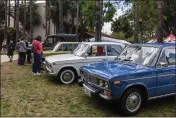  ?? COURTESY OF THE CITY OF WEST HOLLYWOOD ?? Vintage Soviet-era cars line the entry to the Russian Arts and Culture Festival grounds in West Hollywood.