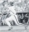  ?? THE ASSOCIATED PRESS FILE PHOTO ?? Pete Rose is pictured on June 10, 1981, picing up his 3,630th career hit, tying Stan Musial’s National League record.