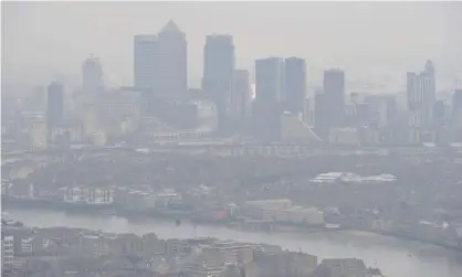  ??  ?? Smog over London in 2015. Lockdowns have led to reduced vehicle traffic and air pollution. Photograph: Nick Ansell/PA