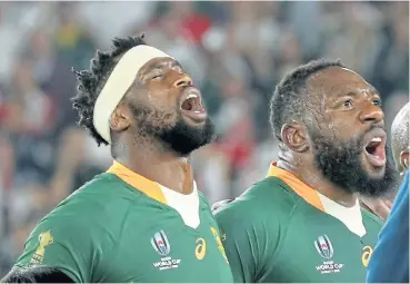  ?? /Getty Images/David Rogers ?? Harnessing passion: Rugby World Cup.
Springbok captain Siya Kolisi and Tendai Mtawarira during an emotional rendition of the SA national anthem at the