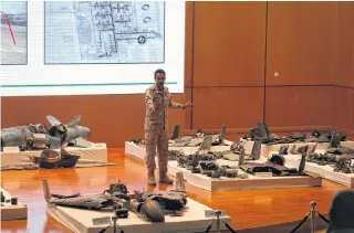  ?? REUTERS ?? Saudi defence ministry spokesman Colonel Turki Al-malik displays remains of the missiles which the Saudi government says were used to attack an Aramco oil facility, during a news conference in Riyadh, Saudi Arabia, on Wednesday. •