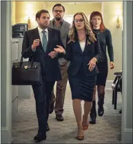  ?? Niko Tavernise / Associated Press ?? This image released by Netflix shows Jonah Hill as Jason Orlean, Leonardo DiCaprio as Dr. Randall Mindy, Meryl Streep as President Janie Orlean and Jennifer Lawrence as Kate Dibiasky in a scene from “Don’t Look Up.”