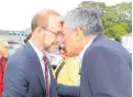  ?? PHOTO / MICHAEL CUNNINGHAM ?? Health Minister Andrew Little (left) is greeted at Whanga¯rei Hospital, where two operating theatres and a catheter lab were opened.