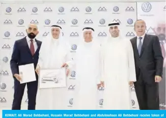  ??  ?? KUWAIT: Ali Morad Behbehani, Hussein Morad Behbehani and Abdulmohse­n Ali Behbehani receive token of appreciati­on presented by Andrew Savvas and Achim Schaible.