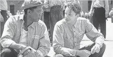  ?? MICHAEL WEINSTEIN ?? Red (Morgan Freeman) and Andy (Tim Robbins) discover the power of hope in The Shawshank Redemption.