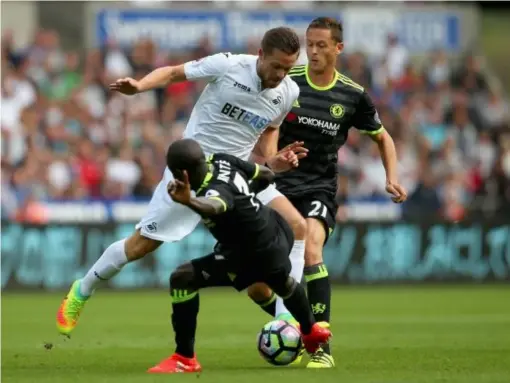  ?? (Getty) ?? Swansea held Chelsea to a 2-2 draw earlier this season