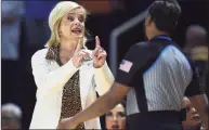  ?? Saul Young / Associated Press ?? LSU coach Kim Mulkey talks with an official during a game on Feb. 27.