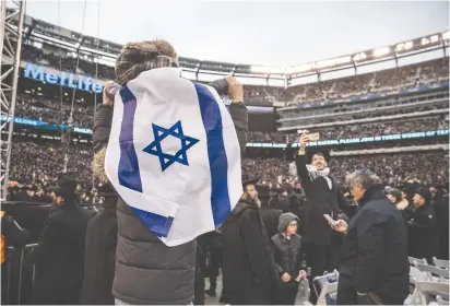  ?? (Reuters) ?? JEWS AT an event at the MetLife Stadium in East Rutherford, New Jersey. ‘These past few days have been a dark period for the Jewish community in the United States.’