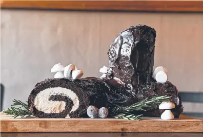  ?? Photos by AAron Ontiveroz, The Denver Post ?? The yule log is a traditiona­l European dessert, a cakey representa­tion of an actual log that you’d put on a fire to burn for warmth.