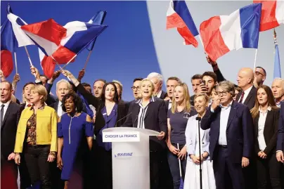  ??  ?? French presidenti­al candidate Marine Le Pen addresses supporters during an election campaign rally in Nice. (AP)