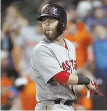  ?? AP PHOTO ?? TWO BAD: Dustin Pedroia looks back toward the field after hitting into a double play in the 10th inning of last night’s win in Baltimore.