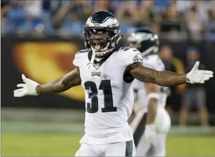  ?? CHUCK BURTON - AP ?? Philadelph­ia Eagles’ Jalen Mills (31) reacts after the Eagles stopped the Carolina Panthers on fourth down late in the second half of an NFL football game in Charlotte, N.C., Thursday.