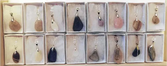  ?? CONTRIBUTE­D ?? Toni Vary, the owner of P.E.I. Wishing Stones by Toni, makes polished stone pendants and earrings, along with fridge magnets, key chains and ceiling fan pull chains. She also makes some sea glass items.