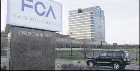  ?? CARLOS OSORIO / ASSOCIATED PRESS 2014 ?? The U.S. government alleged that Fiat Chrysler Automobile­s failed to disclose faulty software.