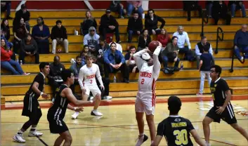  ?? PHOTO AARON BODUS ?? Imperial’s Tony Moreno rises and fires during the Tigers’ Thursday tournament game against CETYS.