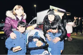  ??  ?? Happy Mylo, Bailey and Teddy Young with mum Jennifer and Gran Catherine