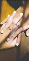  ??  ?? The rings designed for Alex and
Zoe Noor are similar but slightly different, as one is set in 14-karat gold and one in 14-karat white gold; one has a yellow sapphire and the other a blue one.