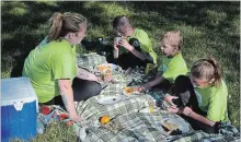  ?? MELINDA CHEEVERS METROLAND ?? Savannah Duggan, right, and her family participat­e in YWCA Niagara’s No Fixed Address sleep-in-your-car-a-thon Friday and Saturday. Joining her, from left, are mom Kelli, and brothers Brayden and Darren.