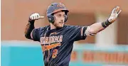  ?? [PHOTO BY BRYAN TERRY, THE OKLAHOMAN] ?? Oklahoma State’s Andrew Rosa gestures after reaching second base on a double in the first inning against TCU on March 31.