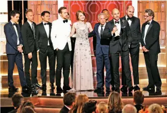  ??  ?? This image released by NBC shows the cast and crew of ‘La La Land’ winner of the award for best motion picture musical or comedy.