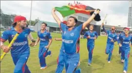  ?? TWITTER ?? Afghanista­n U19 players after lifting the Asia Cup.