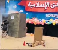  ??  ?? EXECUTED: Body of soldier is left on stage