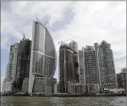  ?? ARNULFO FRANCO / ASSOCIATED PRESS 2011 ?? The Trump Internatio­nal Hotel Panama in Panama City is the third building from left. Panama’s government is investigat­ing a complaint that hotel business executives are refusing to leave.