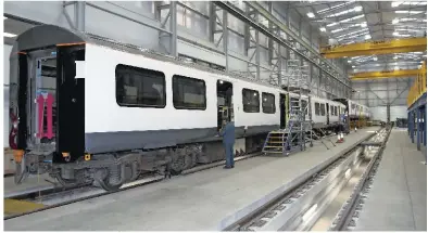  ?? WABTEC RAIL. ?? Abellio Greater Anglia 321303 and 321304 stand in Wabtec Rail’s new Class 321 Renatus project workshop at Doncaster Works on January 20, having just been repainted.