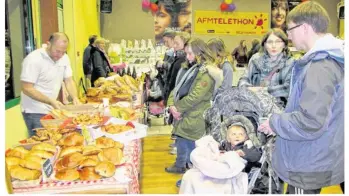  ??  ?? Le Téléthon a démarré par un marché de Noël.