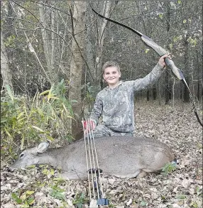  ?? (Courtesy Photo) ?? Zane Harris, 11, has found success deer hunting with his recurve bow.