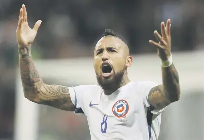  ?? Picture: Getty Images ?? COOL AS ICE. Arturo Vidal of Chile celebrates during their penalty shootout in the Confederat­ions Cup semifinal against Portugal in Kazan on Wednesday.