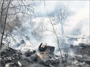  ??  ?? A fire that destroyed a barn and two outbuildin­gs on the Guinea Road in Annapolis County rapidly turned into a mutual aid call.