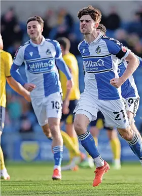  ?? ?? Antony Evans celebrates scoring a late penalty for Rovers