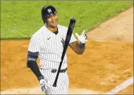  ?? Kathy Willens / Associated Press ?? The Yankees’ Aaron Hicks reacts during an at-bat in the eighth inning against the Rays on Tuesday.