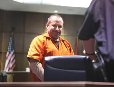  ?? STAFF PHOTO BY ERIN O. SMITH ?? Ben Brewer leaves the courtroom in custody following his sentencing in Judge Don Poole’s Hamilton County courtroom Monday. Brewer was convicted on multiple charges in the deaths of six people when his semitracto­r-trailer crashed into their vehicles on...