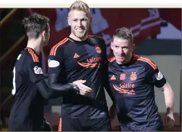  ??  ?? TOUCH OF CLASS: Stockley (centre) is aiming for Hampden after his fine goal