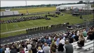  ?? TONY DEJAK — THE ASSOCIATED PRESS ?? Mourners gather for the funeral of Navy Corpsman Maxton Soviak at Edison High School Stadium Sept. 13 in Milan.