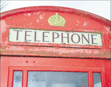  ??  ?? It is thought only 25 red phone boxes are still in use in Kent - but they are increasing­ly taking on a new role in our towns and villages