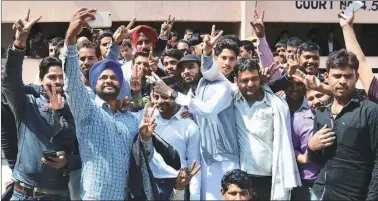  ?? Manoj Kumar ?? Those acquitted outside the Gurgaon District Court, Friday.