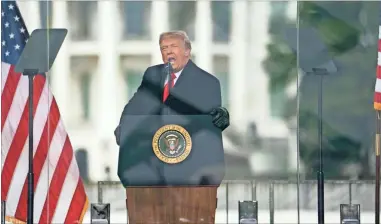  ?? AP-Evan Vucci ?? President Donald Trump speaks during a rally protesting the electoral college certificat­ion of Joe Biden as President, Jan. 6 in Washington. Trump enters the last days of his presidency facing a second impeachmen­t and growing calls for his resignatio­n after his supporters launched an assault on the nation’s Capitol in an effort to disrupt the peaceful transfer of power.