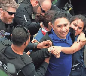  ??  ?? Manuel Duran, a reporter for Spanish-language media during a Memphis, was arrested during a protest on April 3, 2018. JIM WEBER/THE COMMERCIAL APPEAL