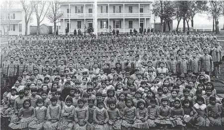  ?? Commons.wikimedia.org ?? In the 19th and 20th centuries, Native American children were taken from their homes and forced to attend assimilati­on schools.