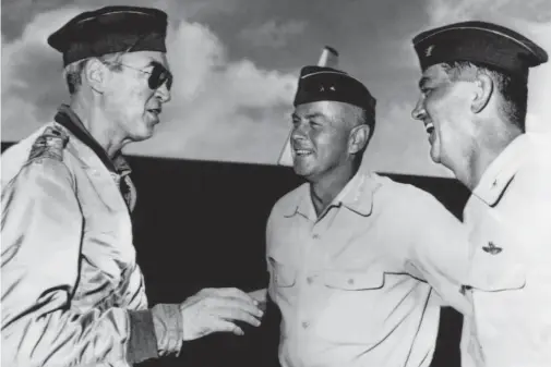  ??  ?? Stewart discussing his flight with other USAF officers. (Photo courtesy of the author)