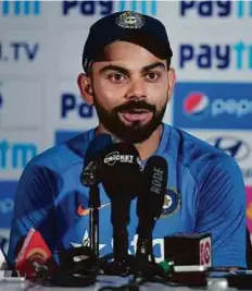  ?? PTI ?? Indian captain Virat Kohli interacts with the media yesterday after a practice session ahead of the first test match against Australia, in Pune starting today.